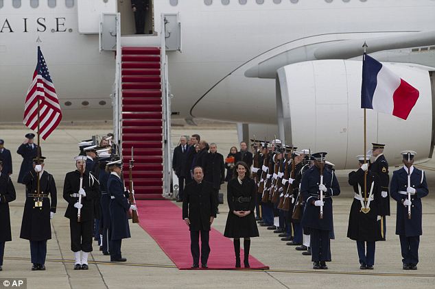 Solo: The rumor comes as French President Francois Hollande arrived in America Monday for a state visit (seen here with Deputy US Chief of Protocol Natalie Jones)