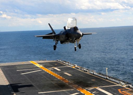 an F-35B Lightning II makes the first vertical landing on a flight deck